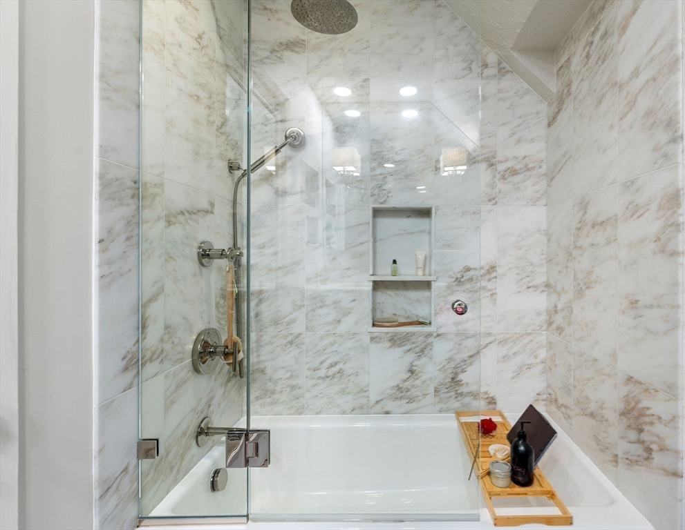 1125 West Roxbury Parkway Brookline, MA 02467 - Photo 29 of 42 a bathroom with a bathtub