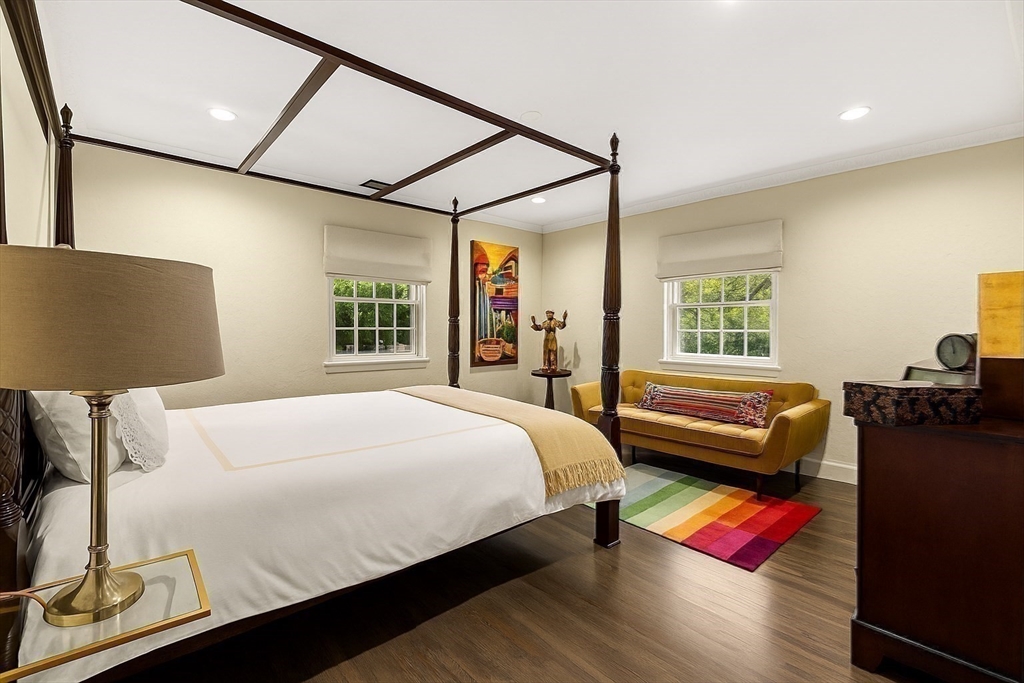 1125 West Roxbury Parkway Brookline, MA 02467 - Photo 30 of 42 a bed room with a bed and a couch