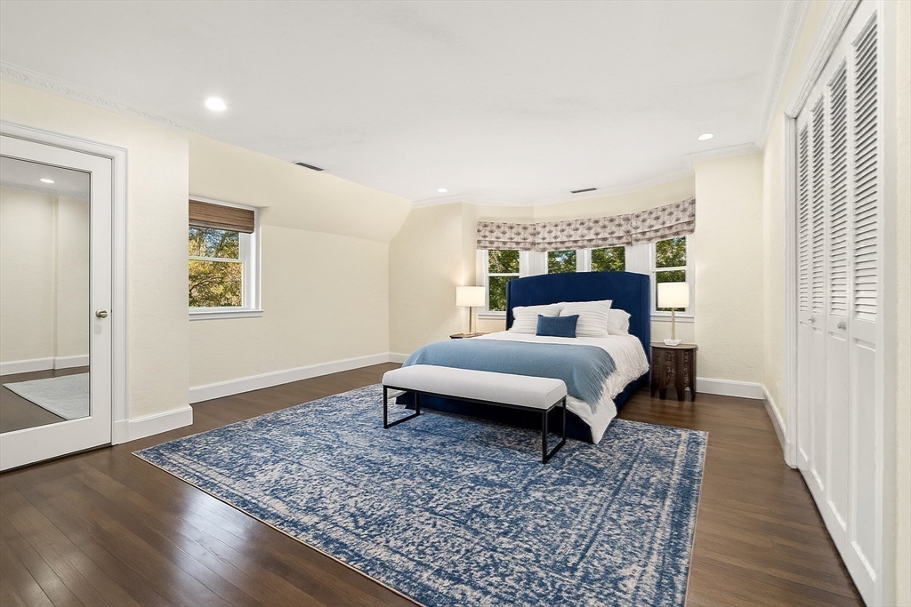 1125 West Roxbury Parkway Brookline, MA 02467 - Photo 33 of 42 a bed room with a bed and a window