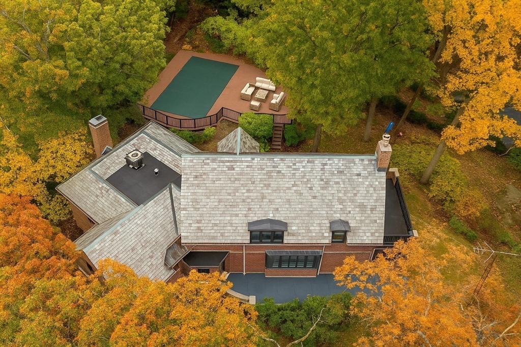 1125 West Roxbury Parkway Brookline, MA 02467 - Photo 38 of 42 aerial view of a house with a yard