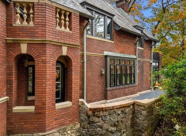 a kitchen with stainless steel appliances a stove a sink and a refrigerator