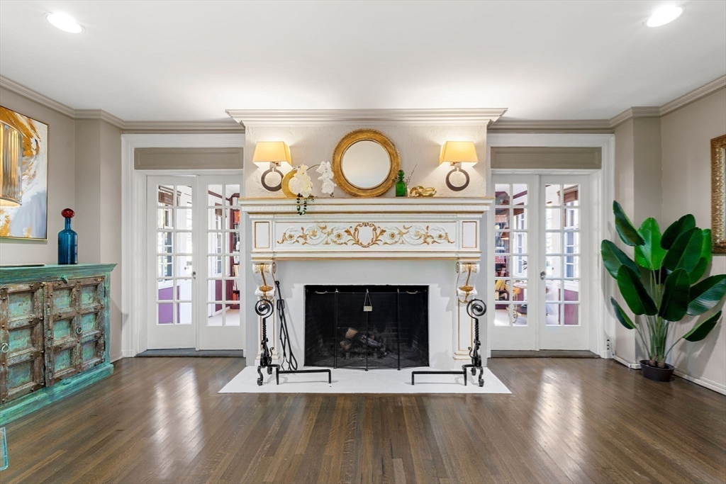 1125 West Roxbury Parkway Brookline, MA 02467 - Photo 10 of 42 a living room with furniture and a fireplace