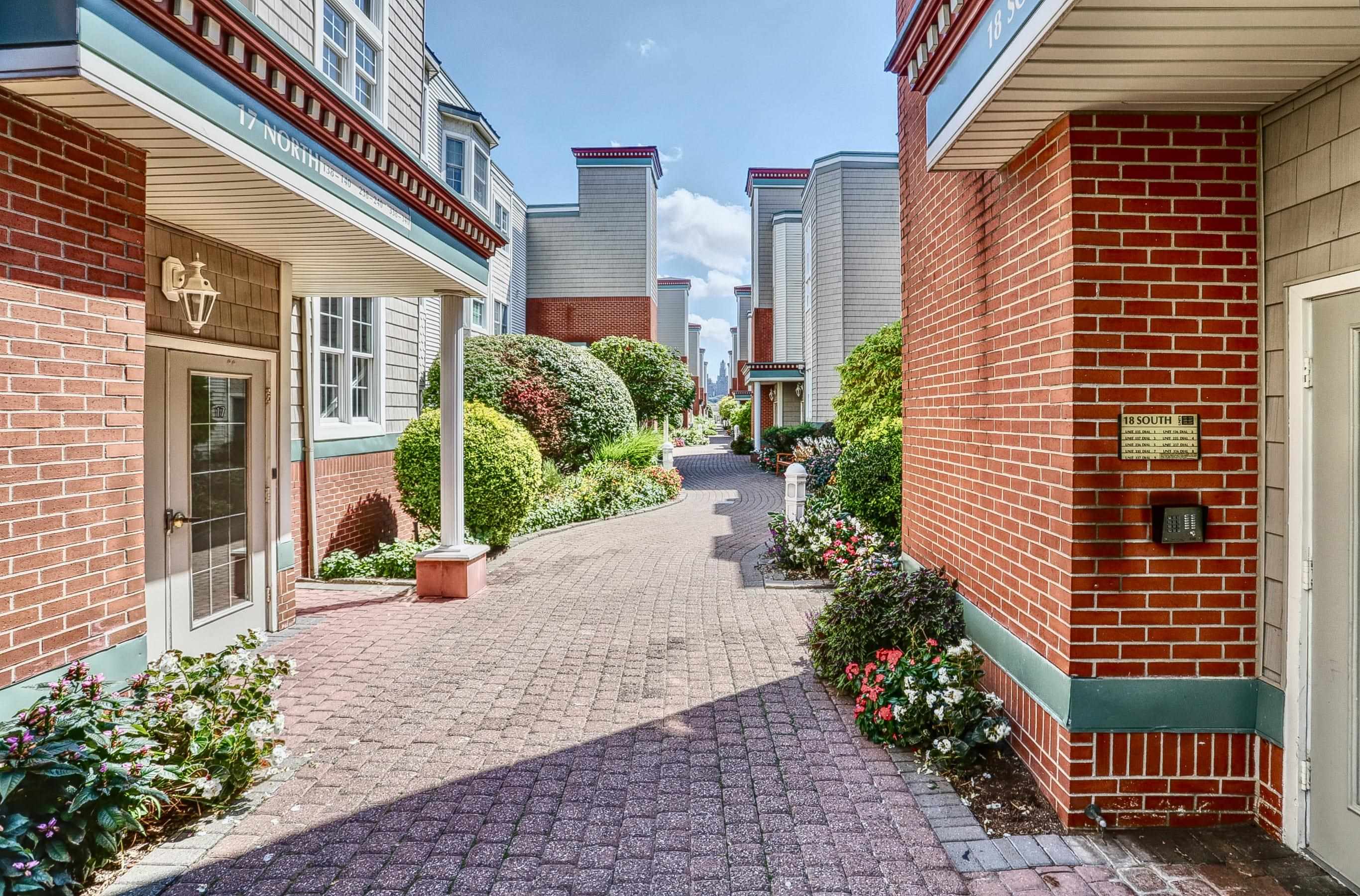 a view of a building with potted plants