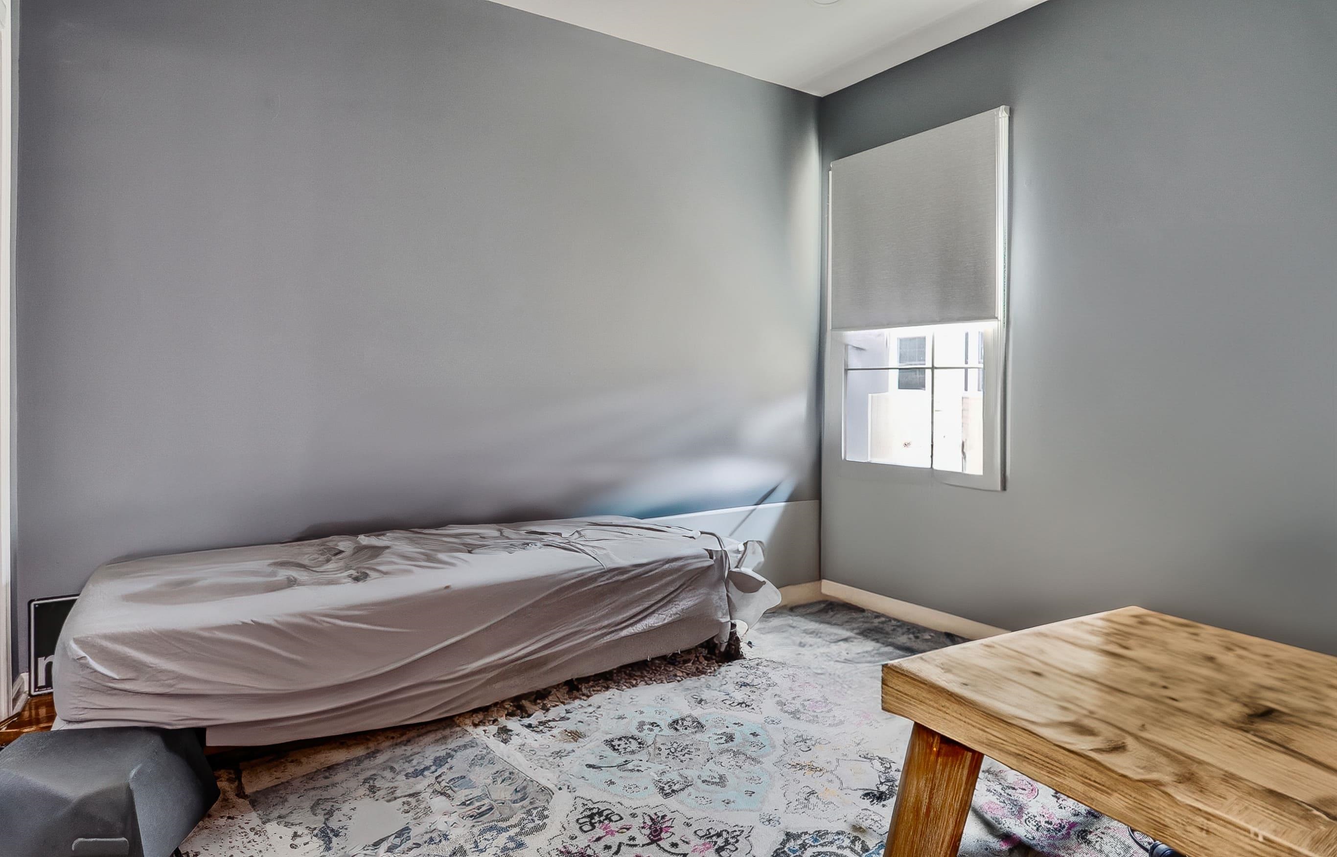 340 The Promenade, Unit 340 Edgewater, NJ 07020 - Photo 18 of 20 a bedroom with a bed and a window