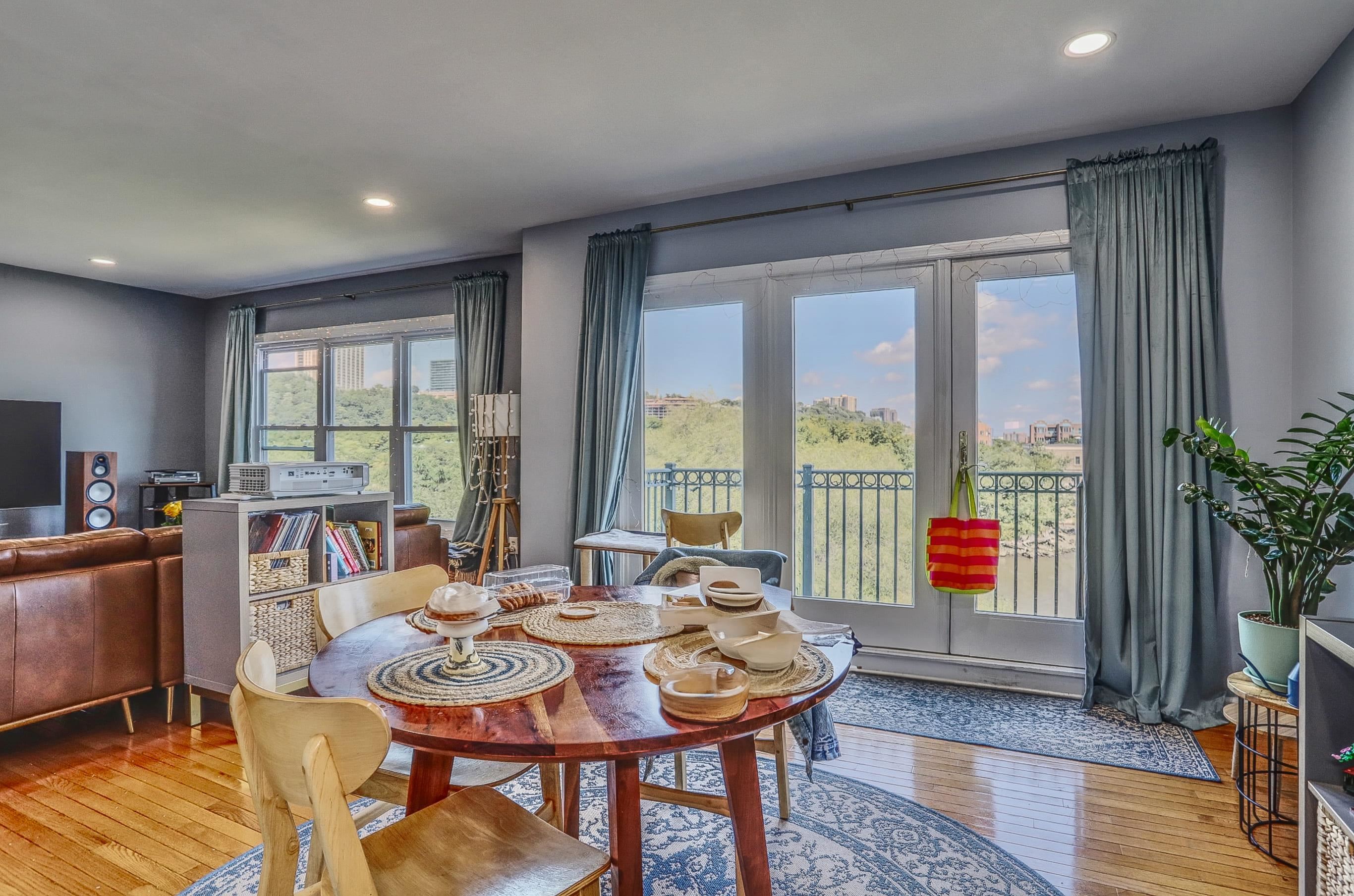 340 The Promenade, Unit 340 Edgewater, NJ 07020 - Photo 6 of 20 a view of a dining room with furniture window and outside view