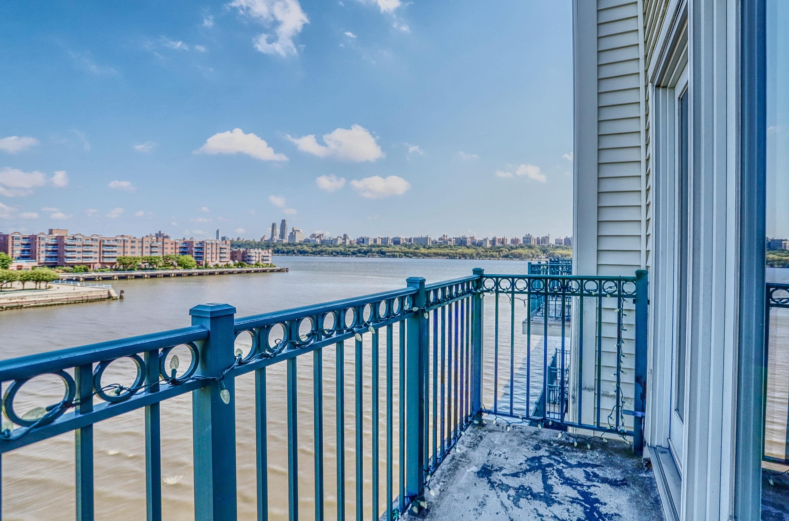 340 The Promenade, Unit 340 Edgewater, NJ 07020 - Photo 8 of 20 a city view from a balcony