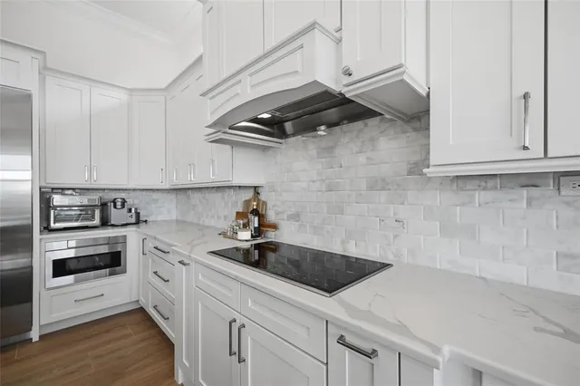 a bed room with a bed and a chair