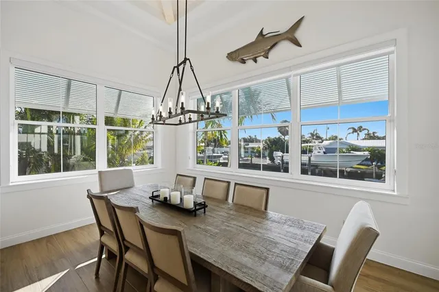 a spacious bathroom with a granite countertop sink a toilet and a shower