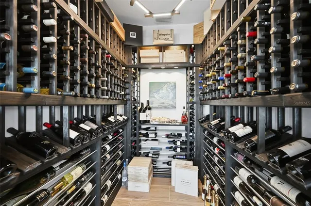 a bedroom with a bed and a table