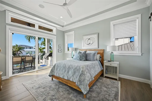 an aerial view of a house with outdoor space lake view and boat