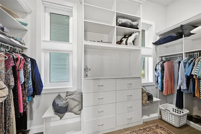 a view of a house with a tub and a potted plant