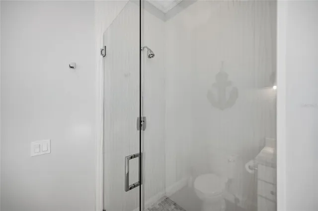 a view of a chairs and table in the balcony