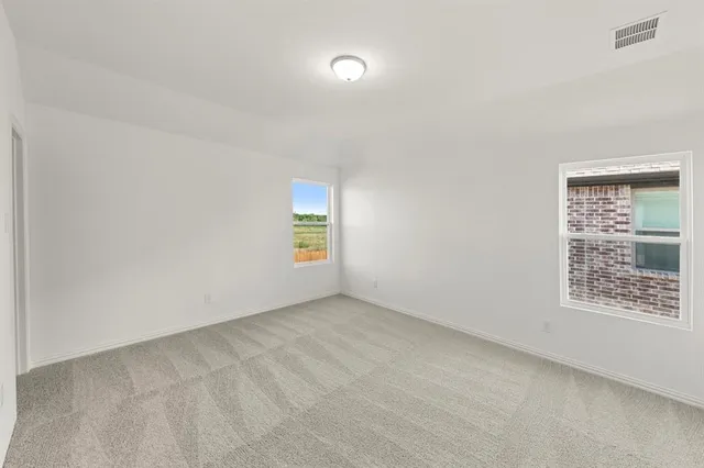 a bathroom with a sink double vanity and a mirror