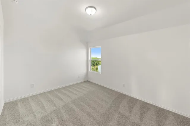 a view of an entryway with wooden floor and stairs