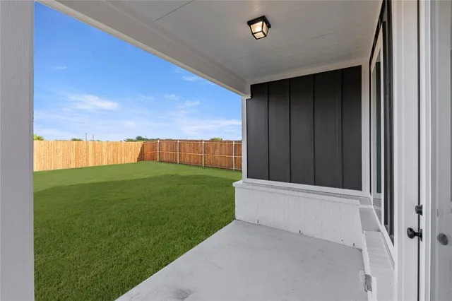 a front view of a building with parking