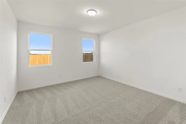 a bathroom with a sink double vanity and a mirror