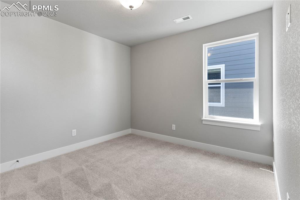 2155 Coyote Mint Drive Monument, CO 80132 - Photo 32 of 45 an empty room with a window