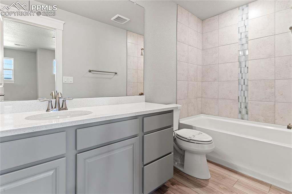 2155 Coyote Mint Drive Monument, CO 80132 - Photo 33 of 45 a bathroom with a sink toilet and bathtub