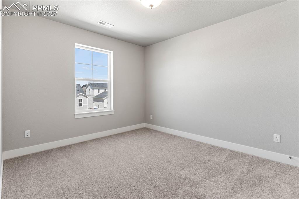 2155 Coyote Mint Drive Monument, CO 80132 - Photo 35 of 45 an empty room with windows