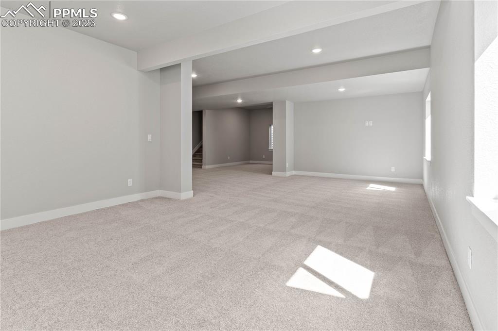 2155 Coyote Mint Drive Monument, CO 80132 - Photo 39 of 45 an empty room with windows and entrance