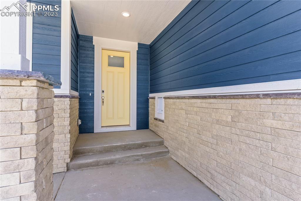 2155 Coyote Mint Drive Monument, CO 80132 - Photo 4 of 45 a view of front door with a door