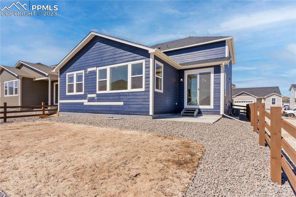 2155 Coyote Mint Drive Monument, CO 80132 - Photo 44 of 45 a front view of a house with a yard