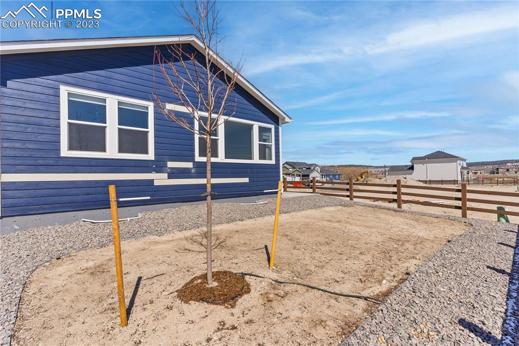 2155 Coyote Mint Drive Monument, CO 80132 - Photo 45 of 45 a view of a house with wooden fence