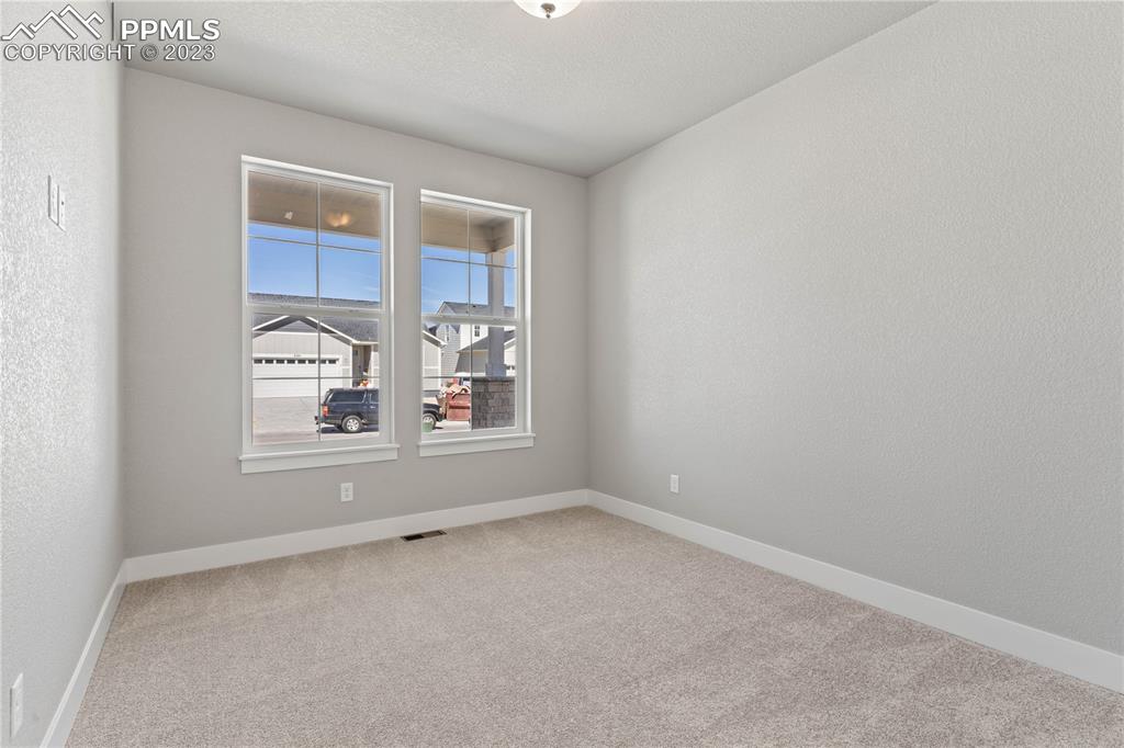 2155 Coyote Mint Drive Monument, CO 80132 - Photo 6 of 45 an empty room with windows