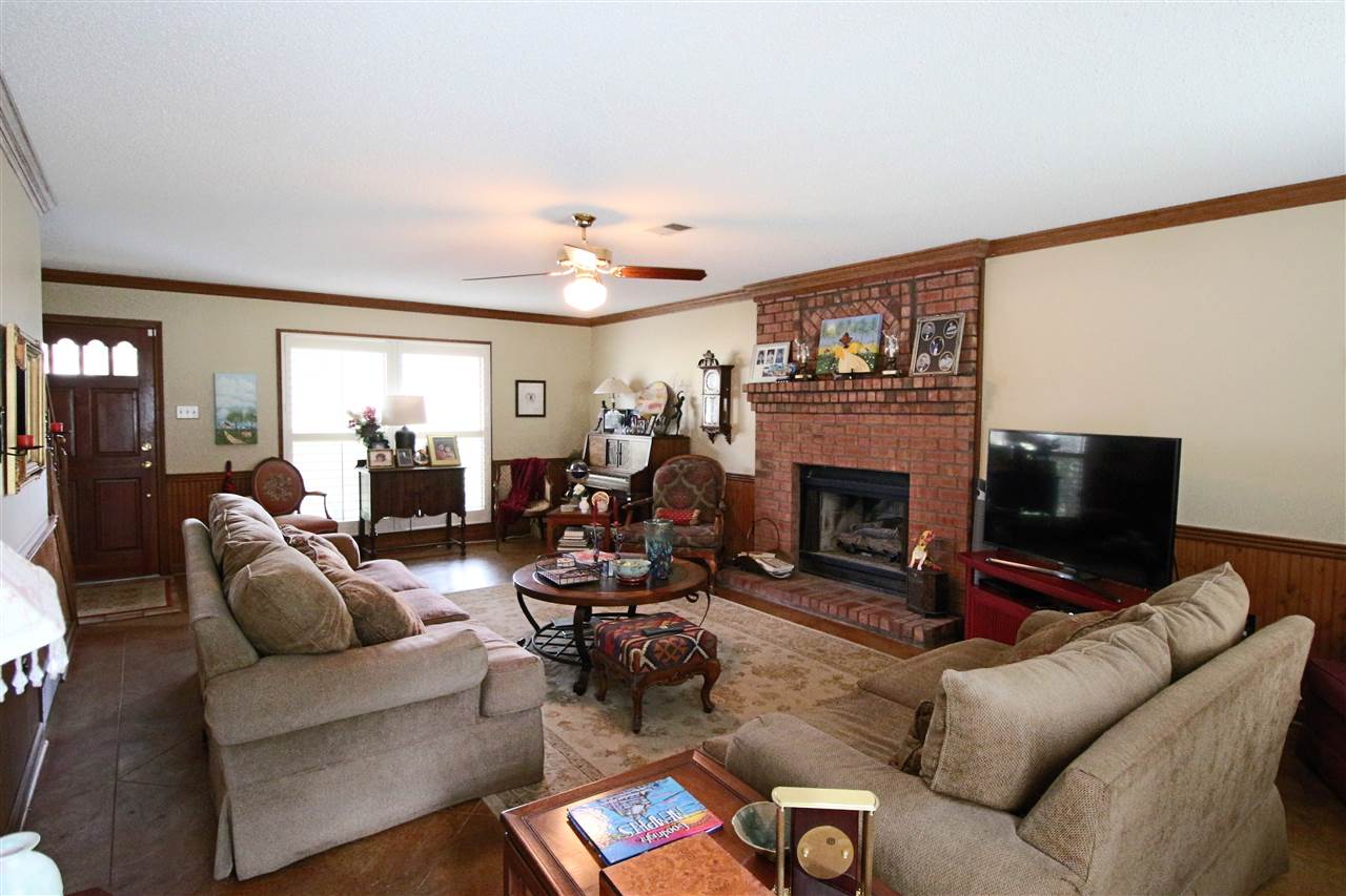 8541 Bazemore Road Memphis, TN 38018 - Photo 4 of 24 a living room with furniture and a fireplace