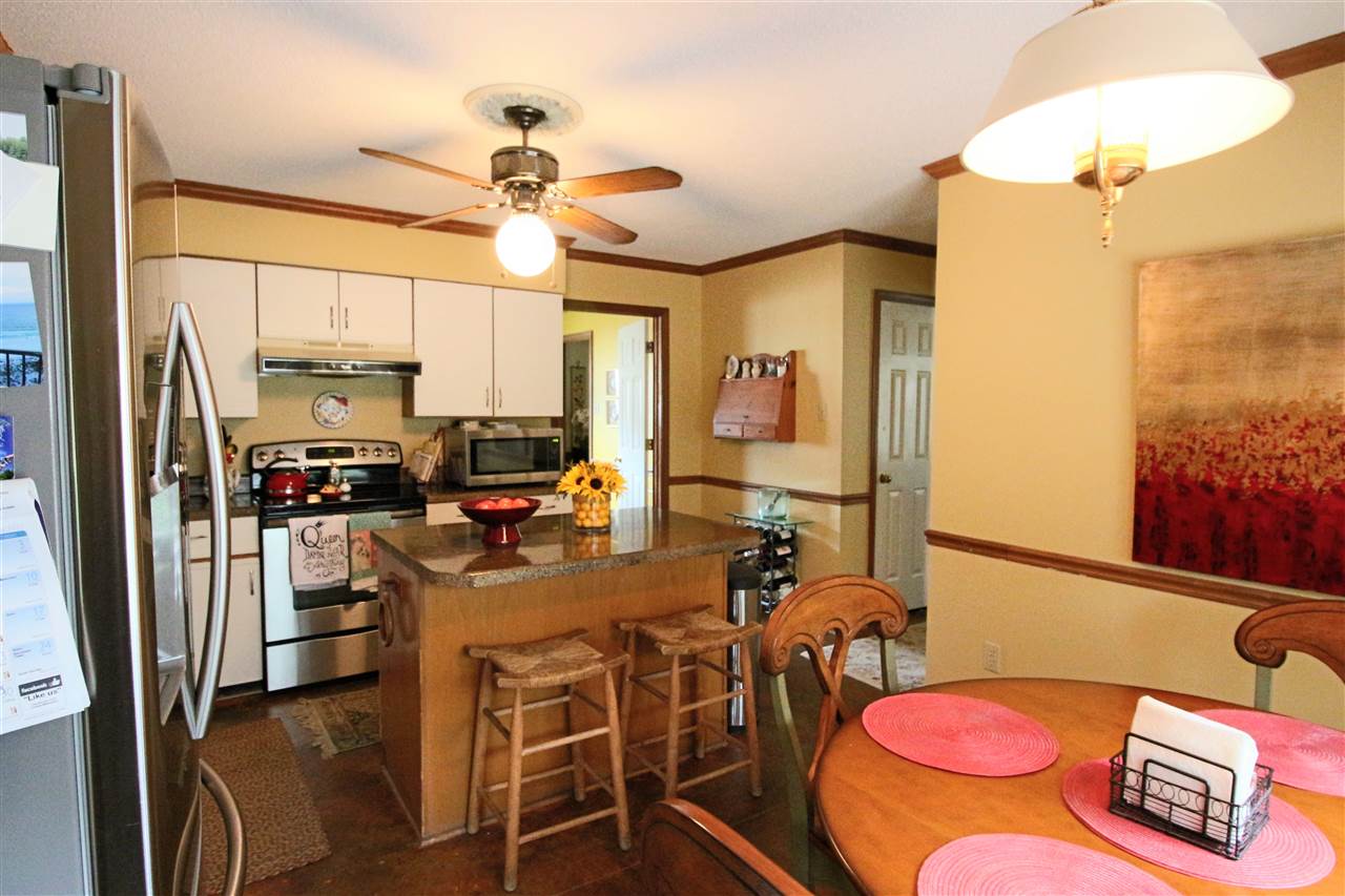 8541 Bazemore Road Memphis, TN 38018 - Photo 7 of 24 a view of a dining room with furniture a chandelier and window