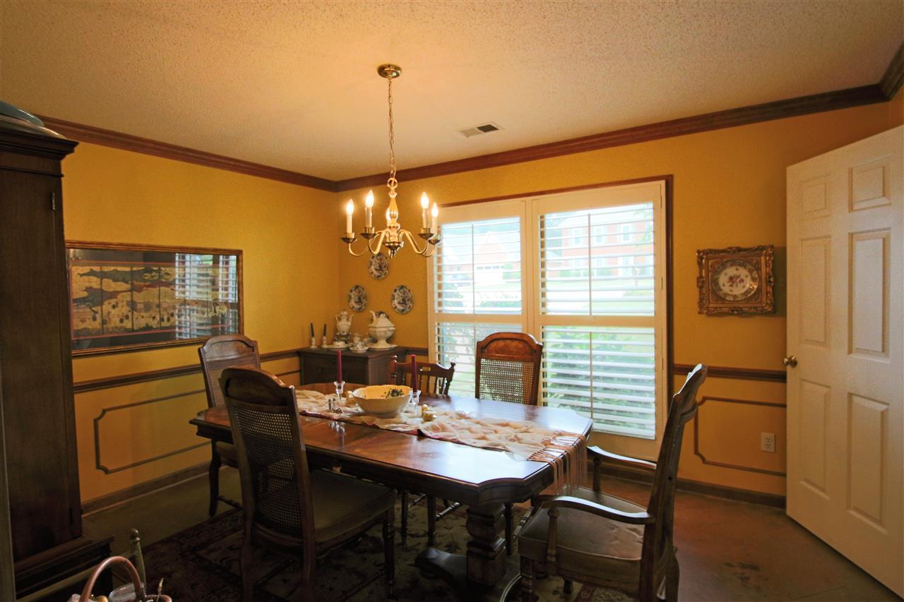 8541 Bazemore Road Memphis, TN 38018 - Photo 10 of 24 a view of a dining room with furniture window and outside view