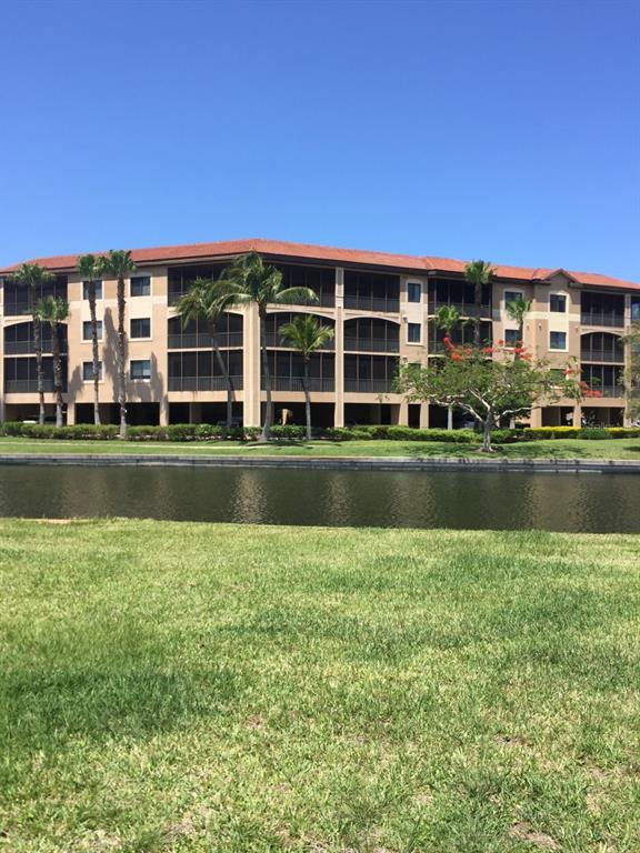 85 Colony Point Drive Punta Gorda, FL 33950 - Photo 3 of 9 a view of a building with a lake view