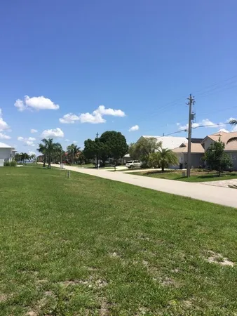 a view of a golf course with a lake