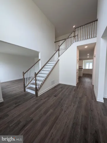 a view of entryway with wooden floor