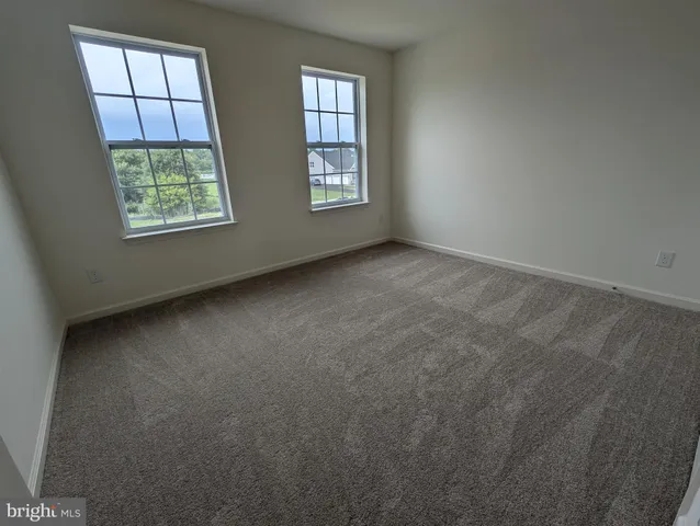 a bathroom with a sink a washer and dryer