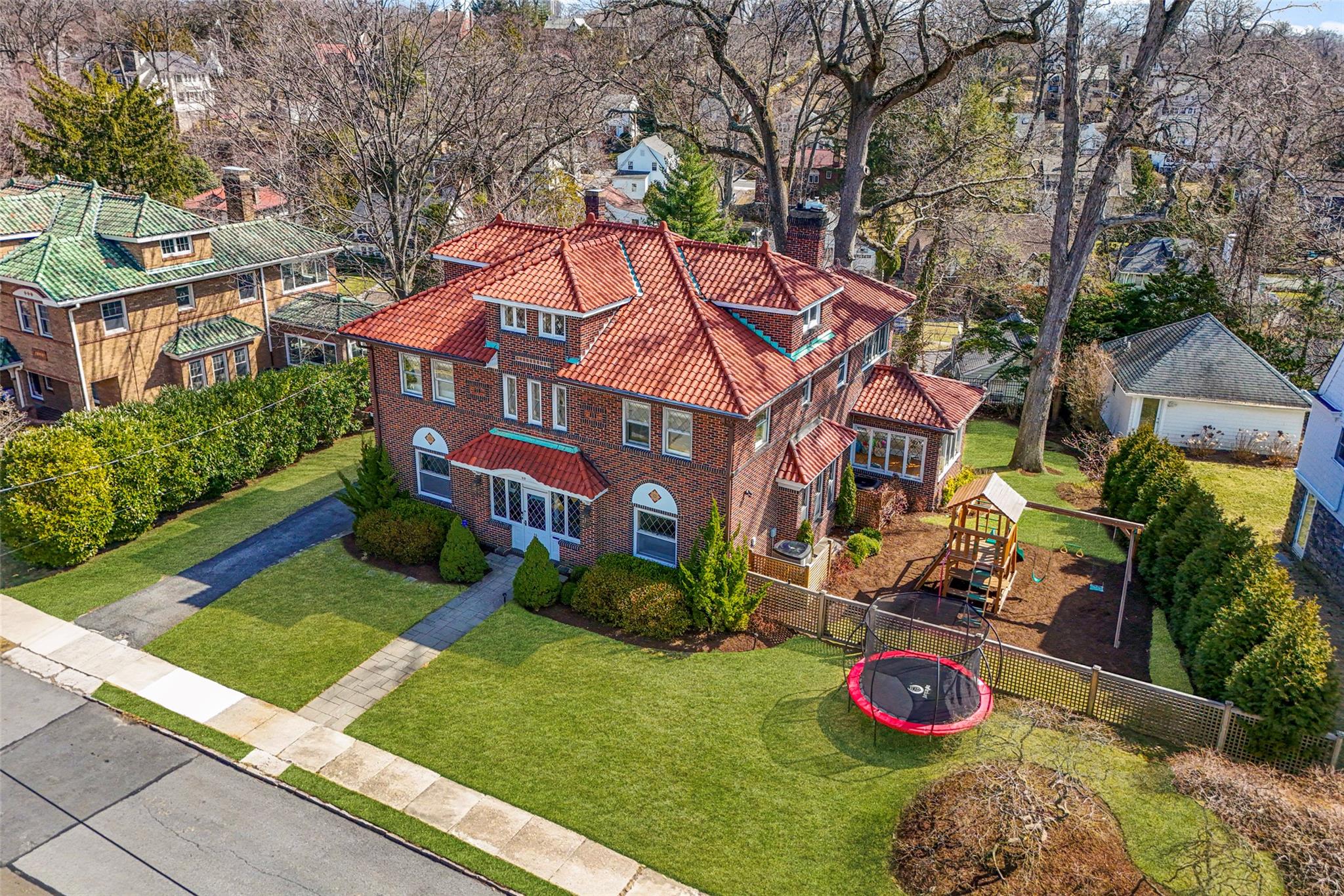 Birds eye view of this stately brick home