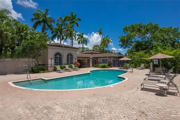 a front view of house with yard and outdoor seating