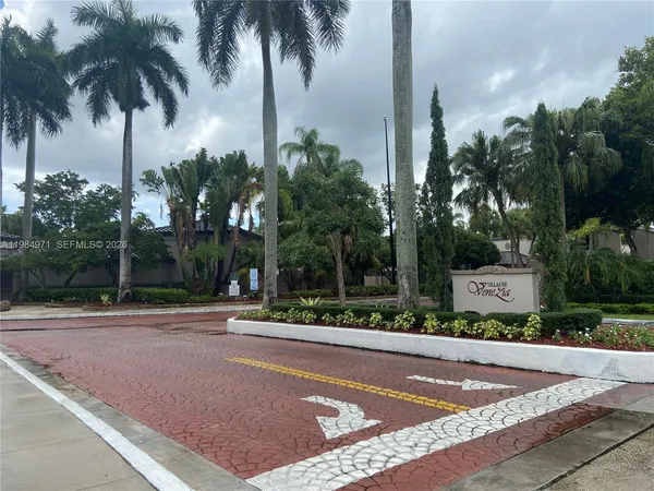 a swimming pool with outdoor seating and yard