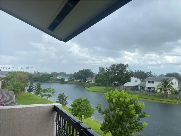 a view of a city from a lake view