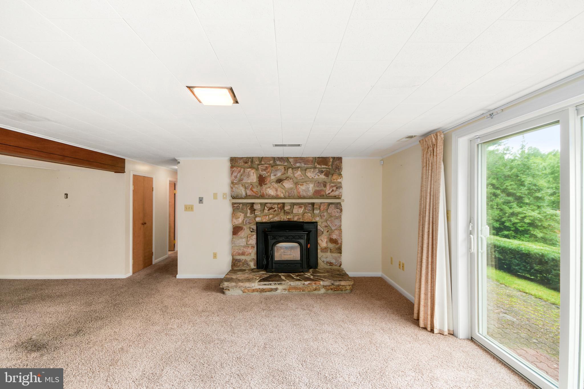 7321 Parkview Drive Frederick, MD 21702 - Photo 37 of 51 2nd Stone Fireplace - w/Pellet Stove