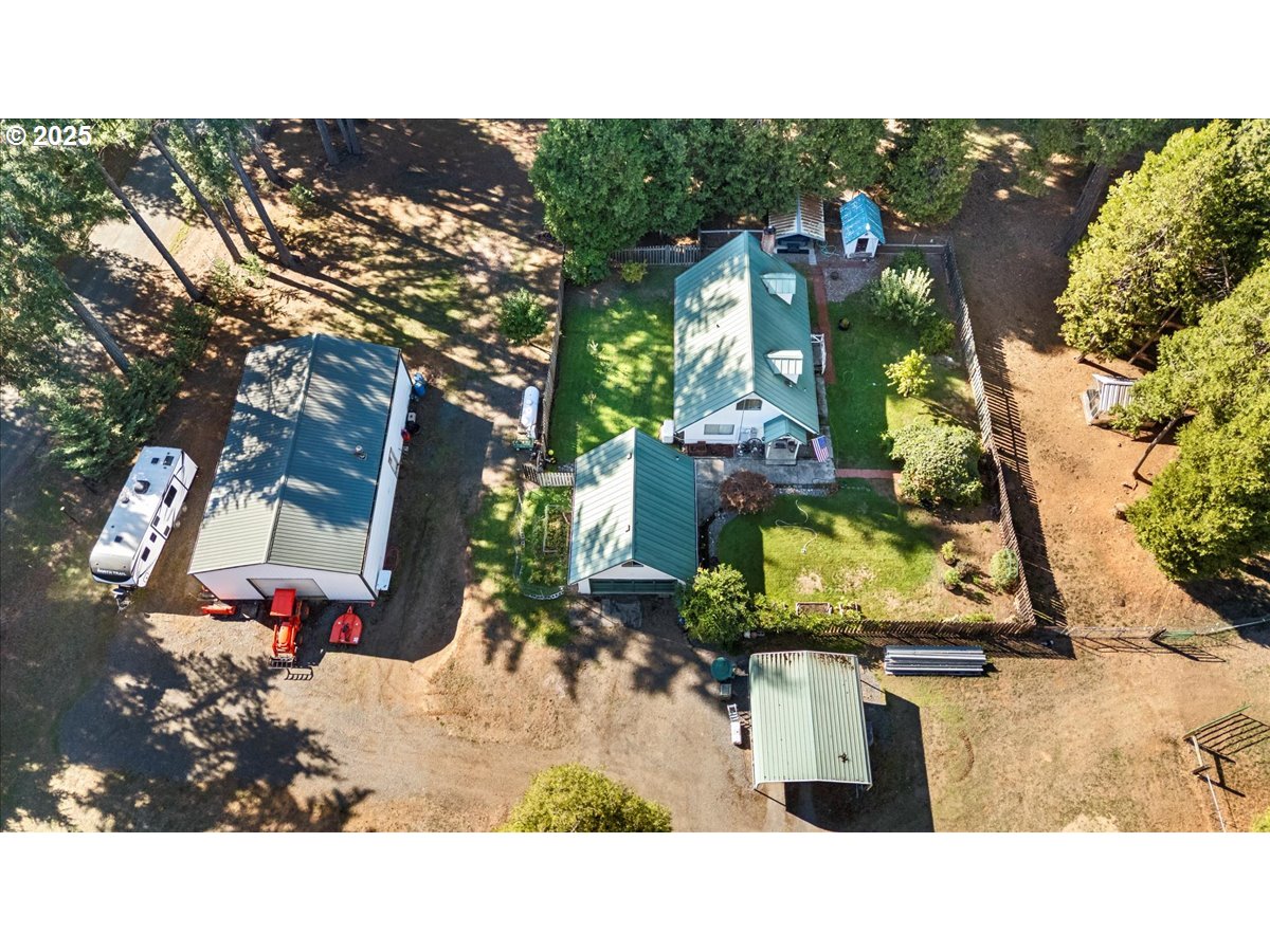 800 Byron Creek Road Winston, OR 97496 - Photo 2 of 35 a outdoor living space with furniture and a potted plant