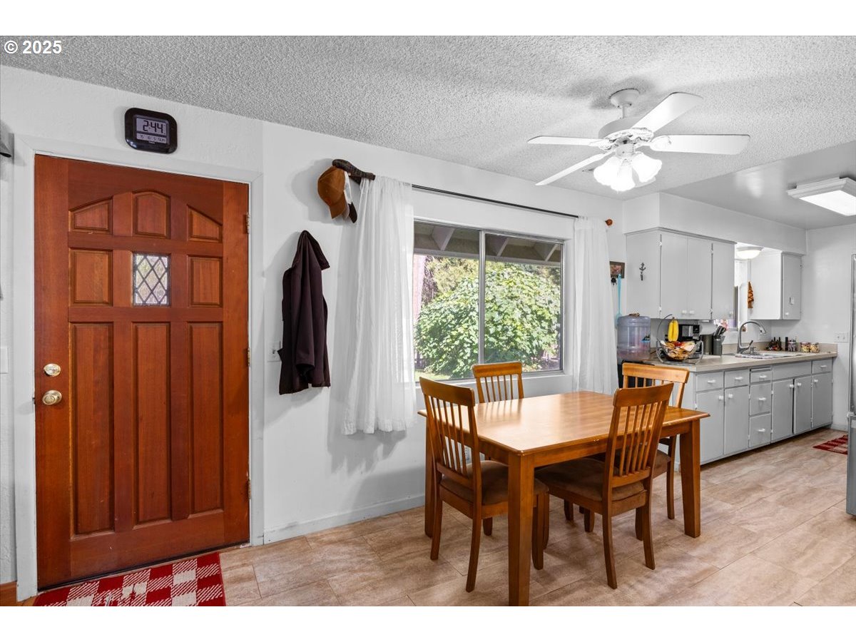 800 Byron Creek Road Winston, OR 97496 - Photo 23 of 35 a dining room with furniture and window