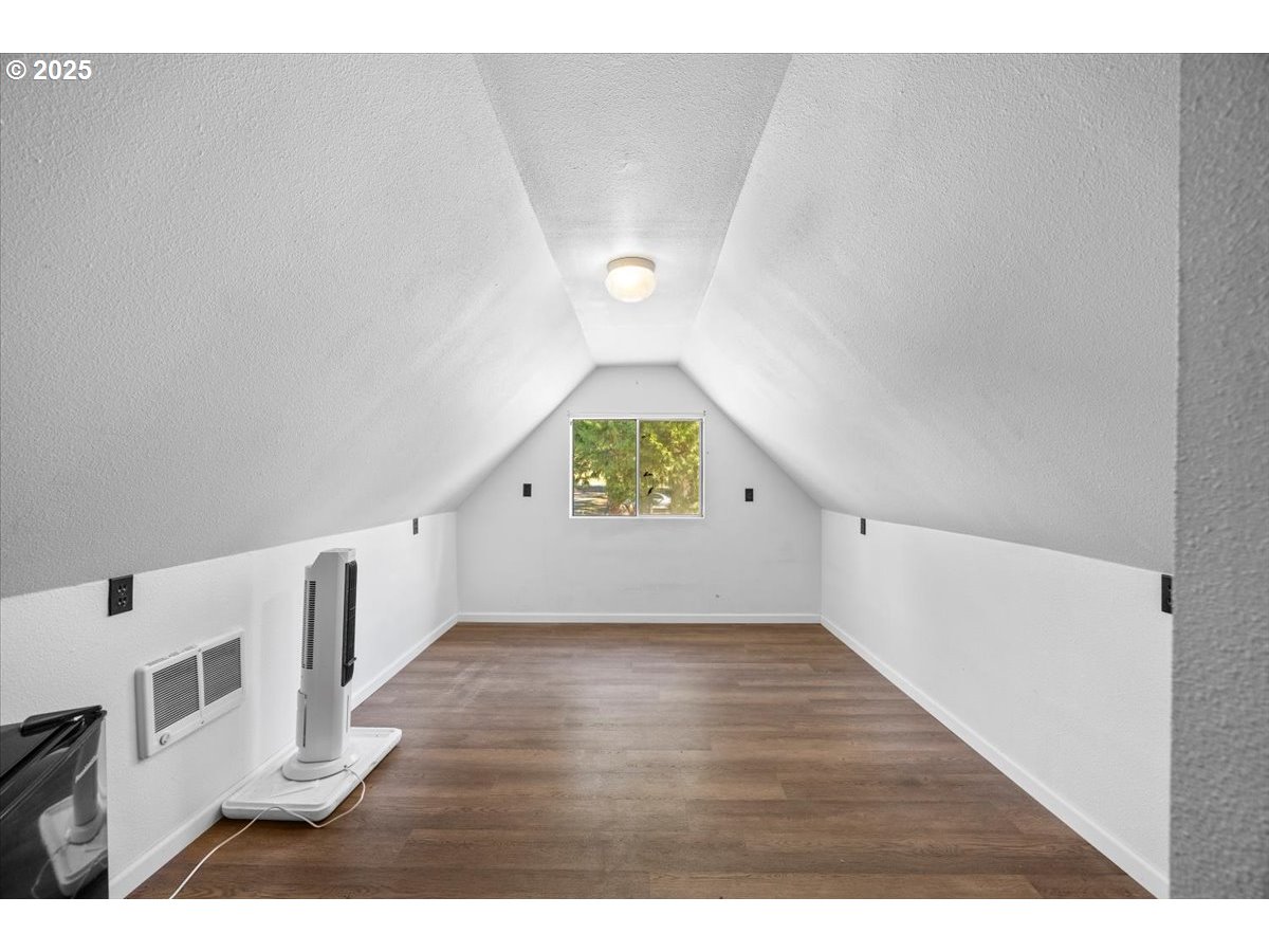 800 Byron Creek Road Winston, OR 97496 - Photo 6 of 35 a view of an empty room with wooden floor