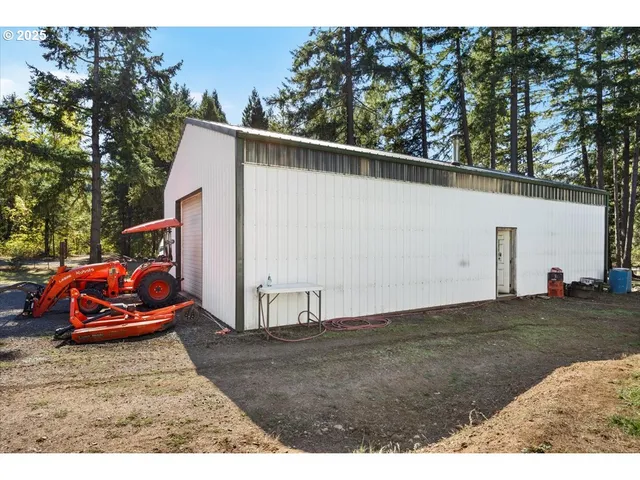 a view of a garage with parked cars