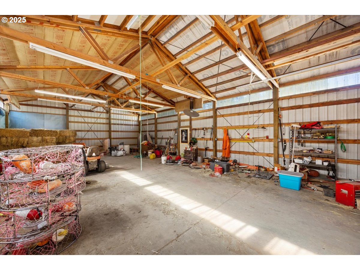 800 Byron Creek Road Winston, OR 97496 - Photo 9 of 35 a view of a garage with parked cars