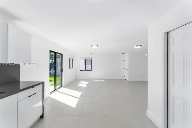 a bathroom with a sink a mirror and vanity