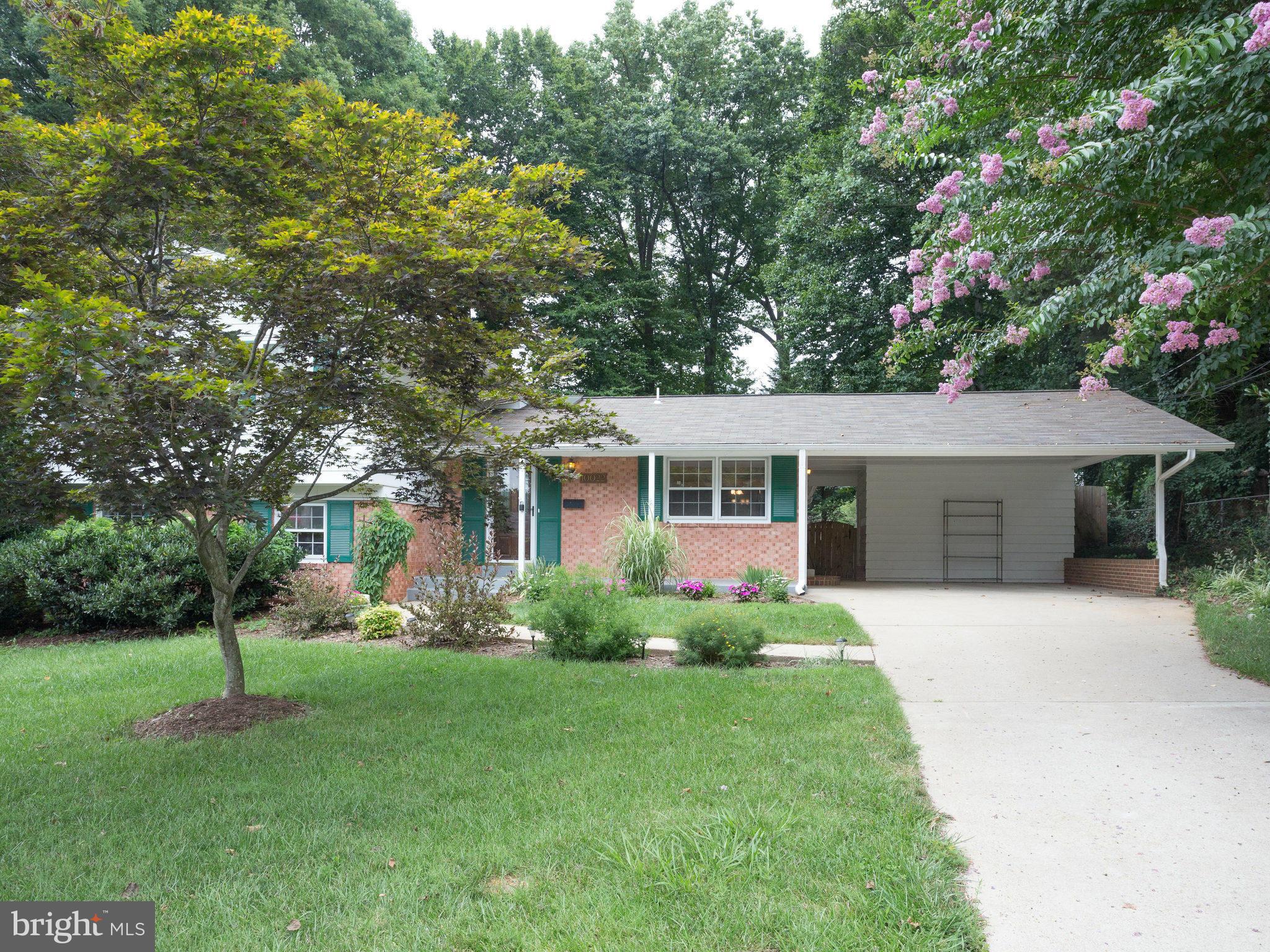 10022 Ranger Road Fairfax, VA 22030 - Photo 2 of 30 front view of a house with a yard