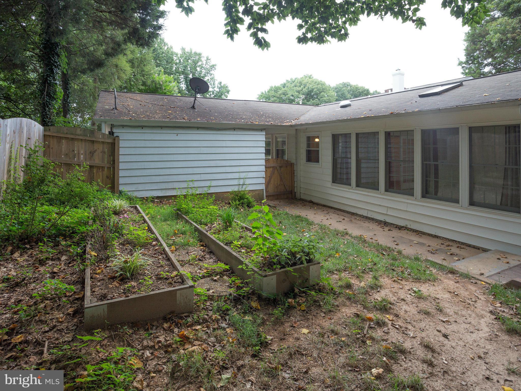 10022 Ranger Road Fairfax, VA 22030 - Photo 27 of 30 a view of a house with a yard