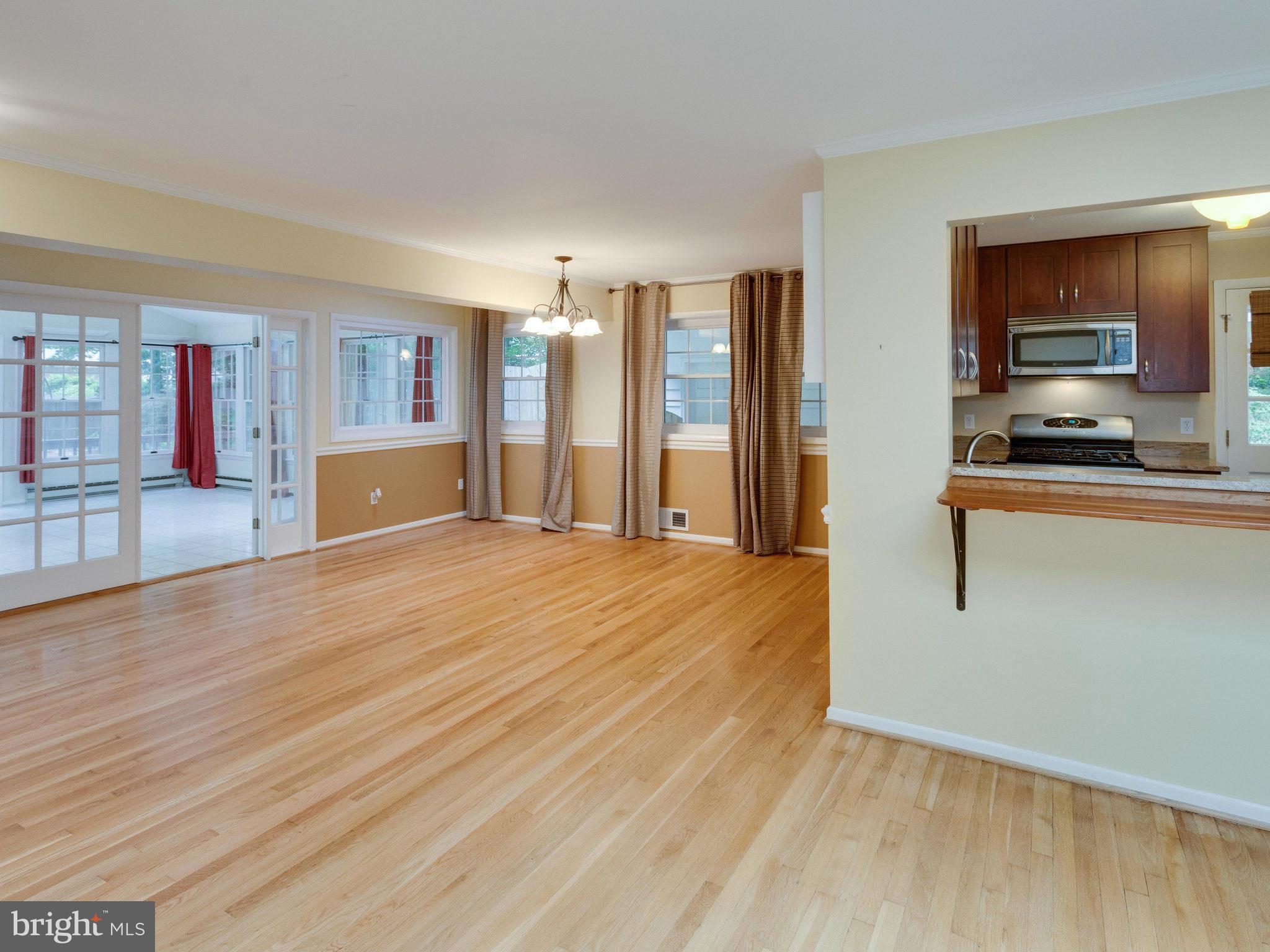 10022 Ranger Road Fairfax, VA 22030 - Photo 5 of 30 a view of a kitchen with furniture and wooden floor