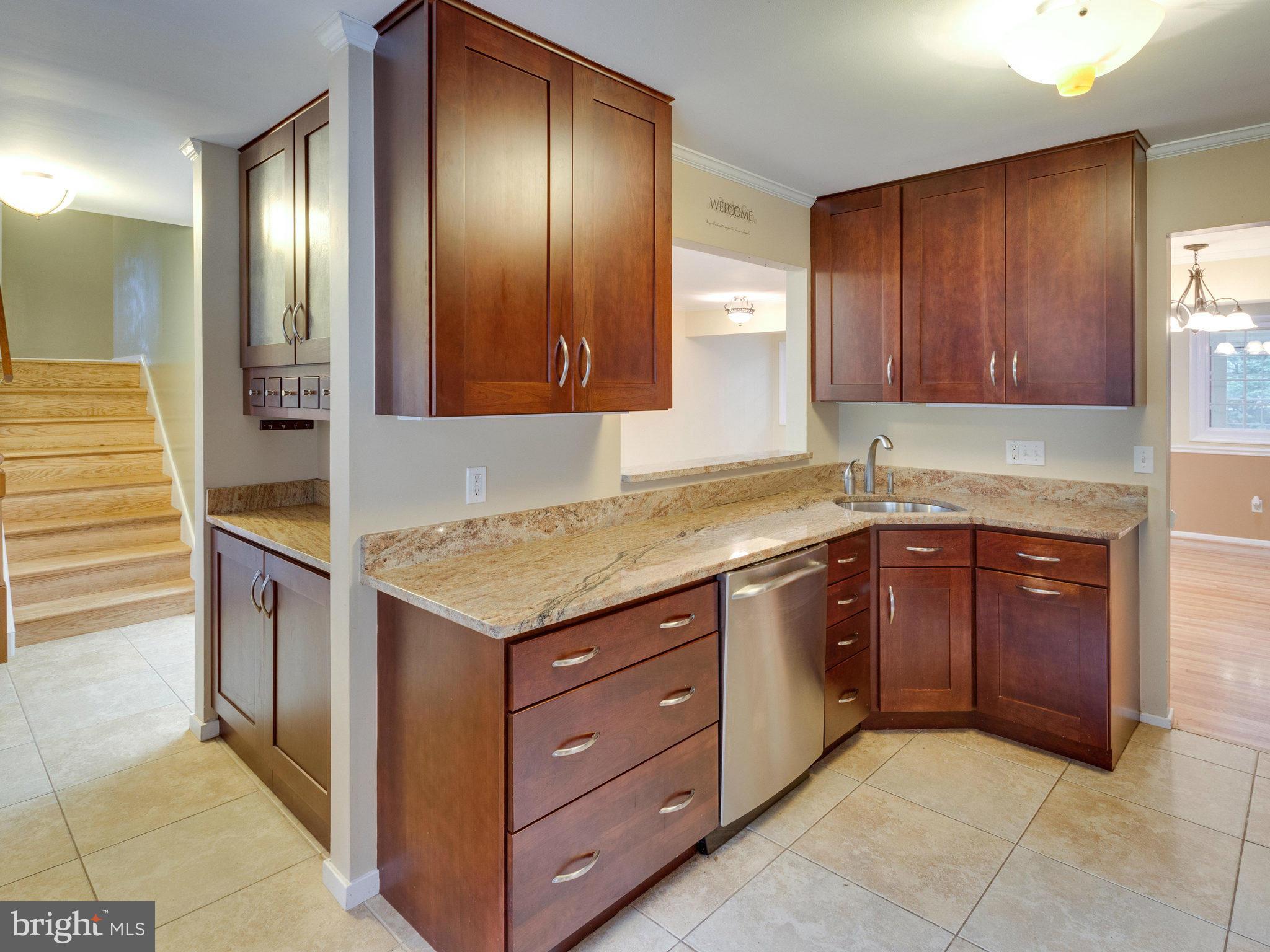 10022 Ranger Road Fairfax, VA 22030 - Photo 9 of 30 a kitchen with a stove and a sink